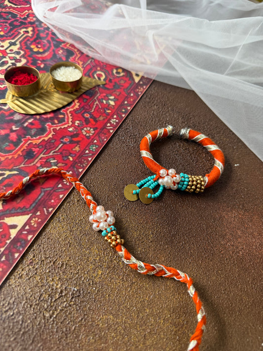 Orange Pearl Couple Rakhi